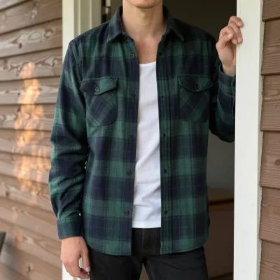 Person in Plaid Shirt on Porch - People - AI generated image