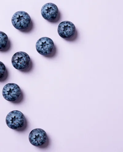 Blueberries Loose on Lavender Background - Food - AI generated image