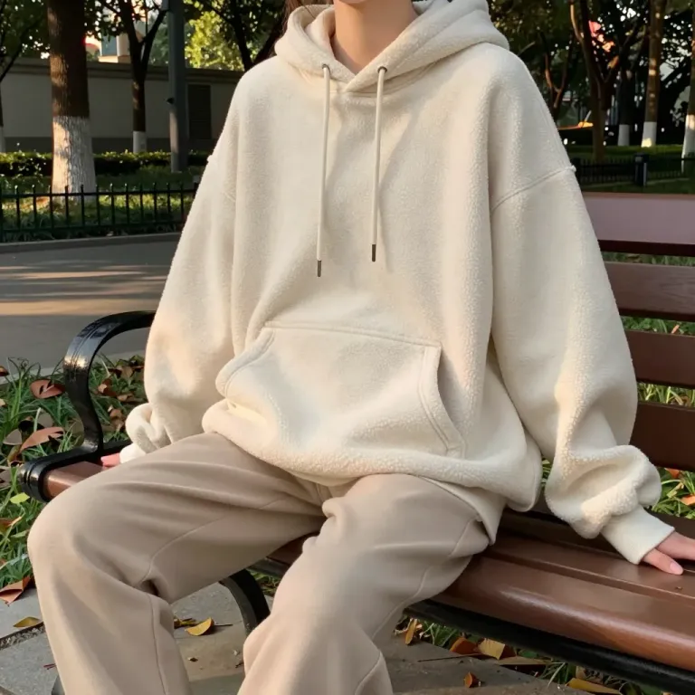 Cream Hoodie Model Relaxing on Wooden Bench - Fashion - AI generated image