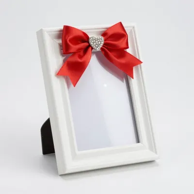 Red Satin Ribbon Bow on White Frame - Decor - AI generated image