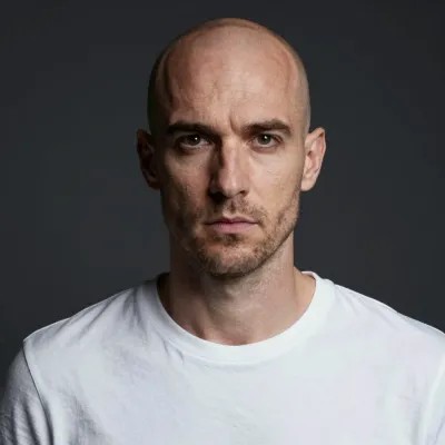 Bald Man Intense Expression White T-Shirt - Portrait - AI generated image