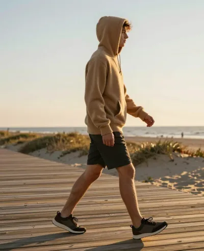 Tan-Hoodie Man Walking Wooden Boardwalk - People - AI generated image