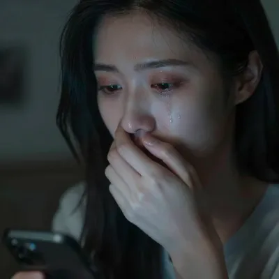 Anxious Woman Crying by Phone Glow - Emotion - AI generated image