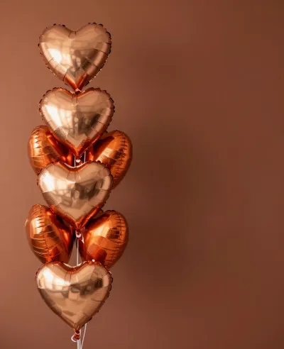 Heart-Shaped Balloons Gleaming in Burnt Orange - Celebration - AI generated image