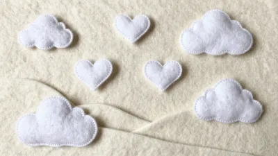Felt Clouds and Hearts on Cream Fabric - Crafting - AI generated image