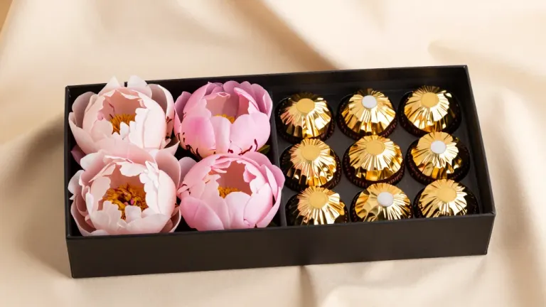 Pink Peonies and Gold Chocolates in Glossy Box - Food - AI generated image