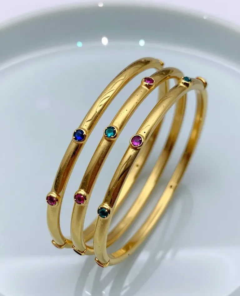 Golden Bangle Stack with Gemstones - Jewelry - AI generated image