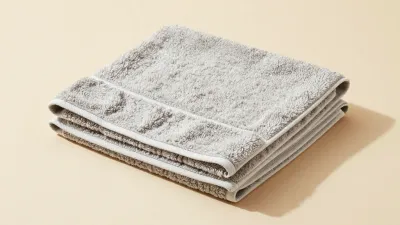 Folded Bath Towels Soft Textured Muted Gray - Bathroom - AI generated image