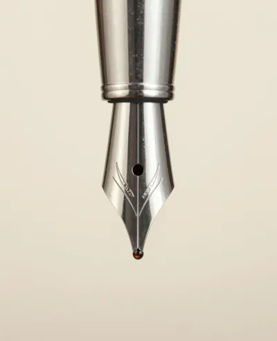 Fountain Pen Nib with Ink Drop - Stationery - AI generated image