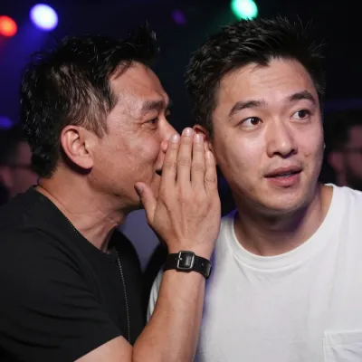 Whispering Men at Concert - Interaction - AI generated image