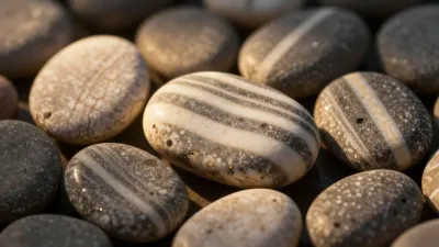 Smooth Stones with White Veining in Warm Spotlight - Natural - AI generated image