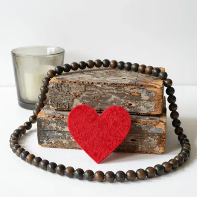 Reclaimed Wood Stack with Beads and Heart - Still Life - AI generated image