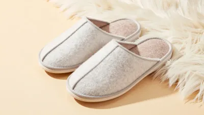 Felt Slippers Cozy on Fur Rug - Footwear - AI generated image