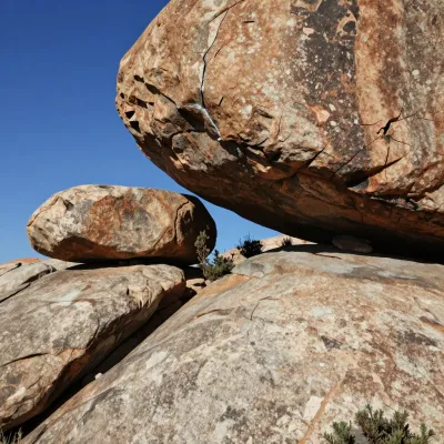 Balanced Boulder Overhang in Desert - Geology - AI generated image
