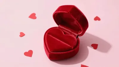 Red Velvet Ring Box with Gleaming Ring - Jewelry - AI generated image