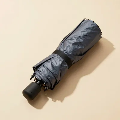 Dark Gray Compact Umbrella Folded with Black Strap - Umbrella - AI generated image