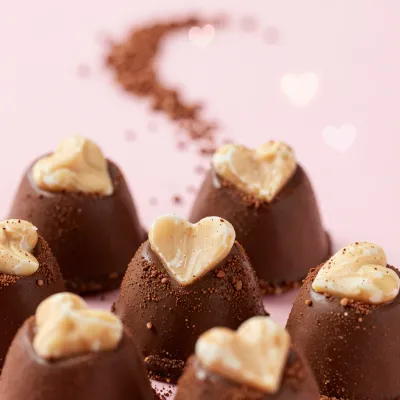 Chocolate Pralines with Heart Decorations - Food - AI generated image