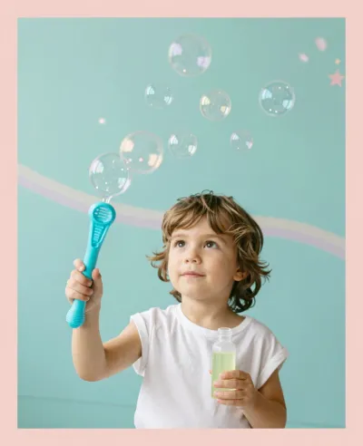 Child Blowing Bubbles with Wand - Children - AI generated image