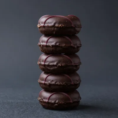 Stacked Mini Donuts with Dark Chocolate Glaze - Food - AI generated image