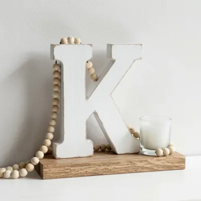 Weathered White 'K' with Beads - Decor - AI generated image