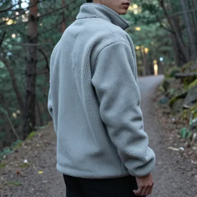 Person in Fleece Jacket on Forest Trail - People - AI generated image