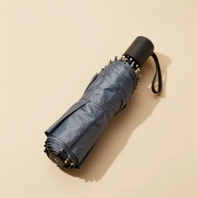 Compact Umbrella Folded Smooth Black Handle - Umbrella - AI generated image