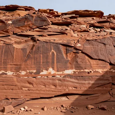 Layered Canyon Wall Textured by Golden Sunlight - Geology - AI generated image