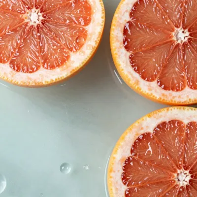 Grapefruit Halves Sliced Juicy Pink Flesh - Food - AI generated image