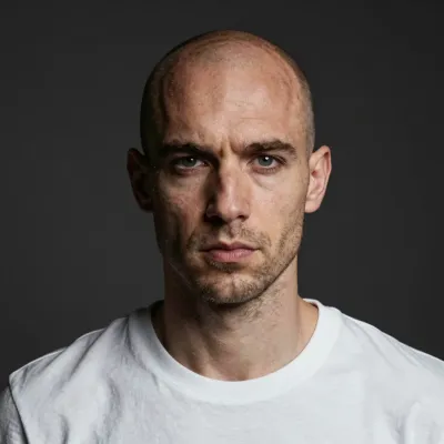 Bald Man Intense Expression in White T-Shirt - Portrait - AI generated image
