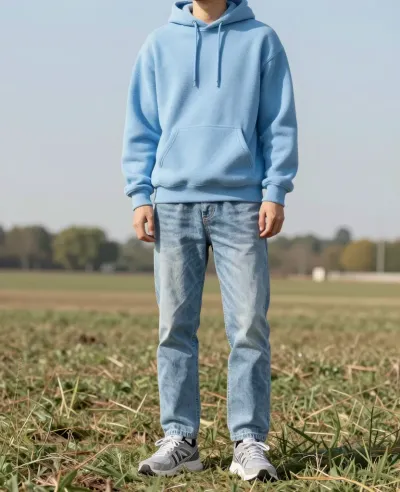 Person in Light Blue Hoodie Standing in Field - Fashion - AI generated image