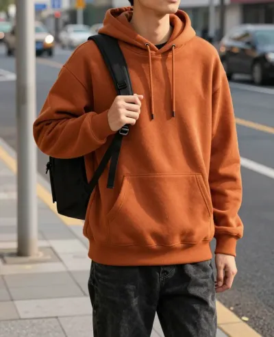 Person in Orange Hoodie at Bus Stop - Fashion - AI generated image
