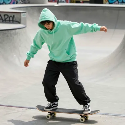 Skateboarder in Mint-Green Hoodie at Skatepark Bowl - People - AI generated image