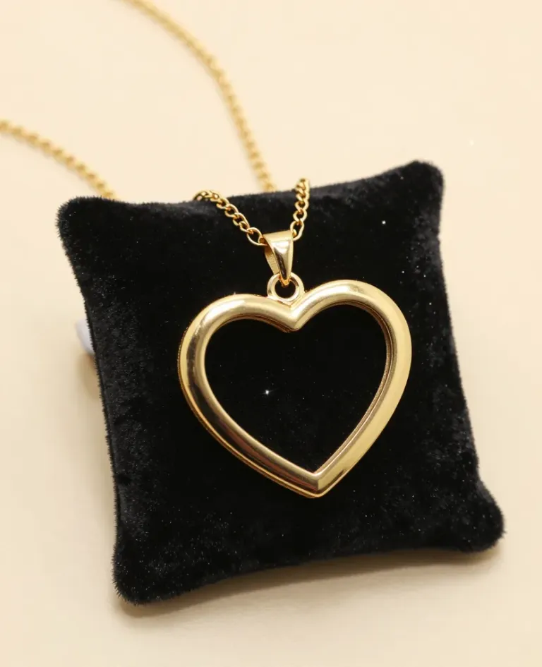 Gold Heart Locket on Velvet Cushion - Jewelry - AI generated image