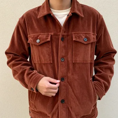 Rust-Corduroy-Jacket Soft-Lit Texture Focus - Fashion - AI generated image