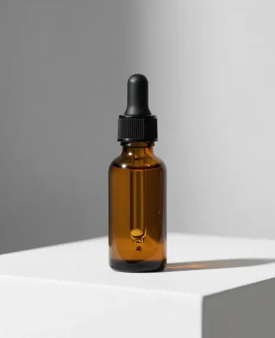 Amber Dropper Bottle with Soft Light Reflections - Bottles - AI generated image