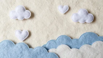 Felt Clouds and Hearts on Textured Fabric - Crafts - AI generated image