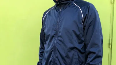 Navy Blue Track Jacket with White Piping on Neon Green Wall - Fashion - AI generated image