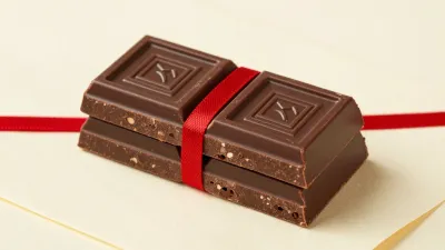 Chocolate Bars with Red Ribbon Stack - Food - AI generated image