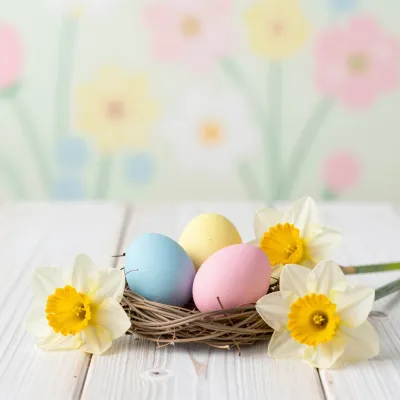 Pastel Eggs Nestled with Daffodils - Easter - AI generated image