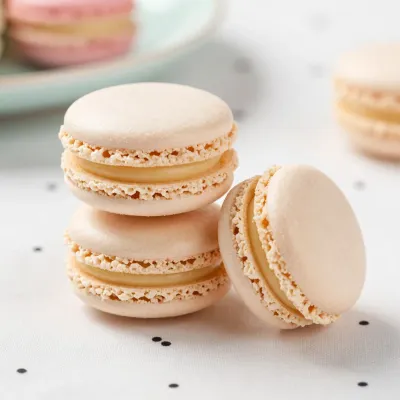 Vanilla Bean Macarons Stacked and Broken - Food - AI generated image