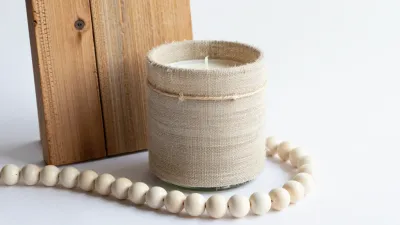 Burlap-Wrapped Candle with Wooden Frame and Beads - Decor - AI generated image