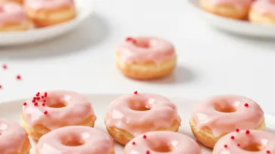 Raspberry-Glazed Donut Holes with Red Sprinkles - Food - AI generated image