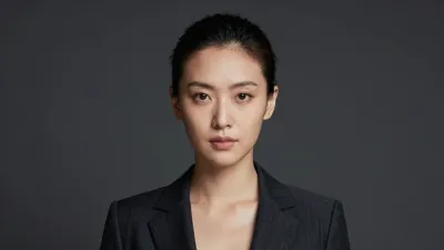 Serious Businesswoman in Dark Blazer - People - AI generated image