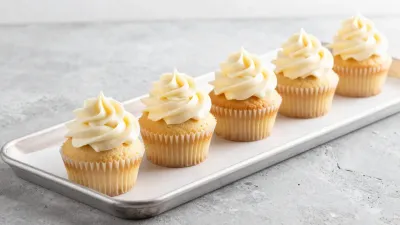 Vanilla Cupcakes with White Frosting - Food - AI generated image