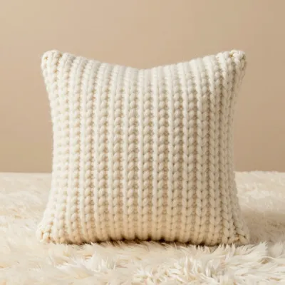 Knit Pillow Softly Lit in Neutral Palette - Furniture - AI generated image