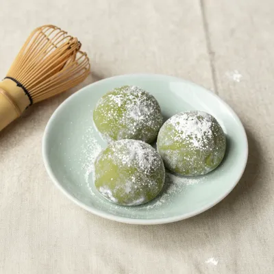 Matcha Mochi Balls with Powdered Sugar - Food - AI generated image