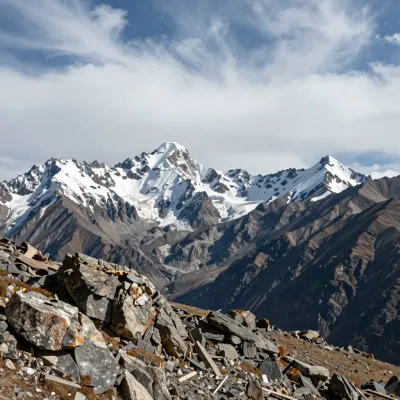 Rocky Foreground Leading to Snow-Capped Peaks - Landscape - AI generated image