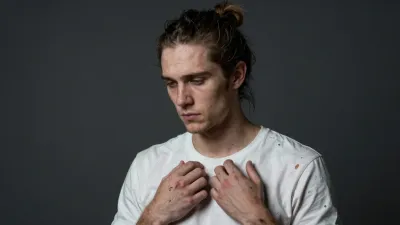 Person with Stained T-Shirt in Soft Light - People - AI generated image