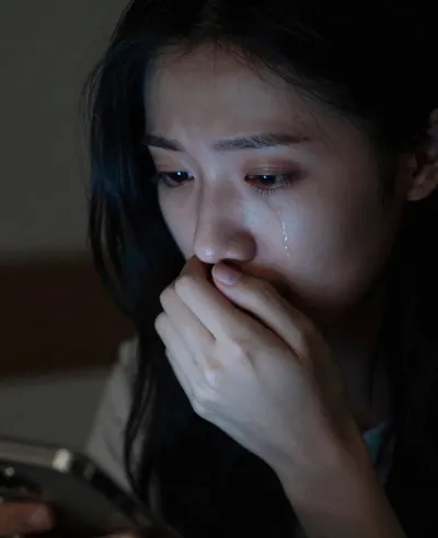 Anxious Woman with Phone Glow - Portrait - AI generated image