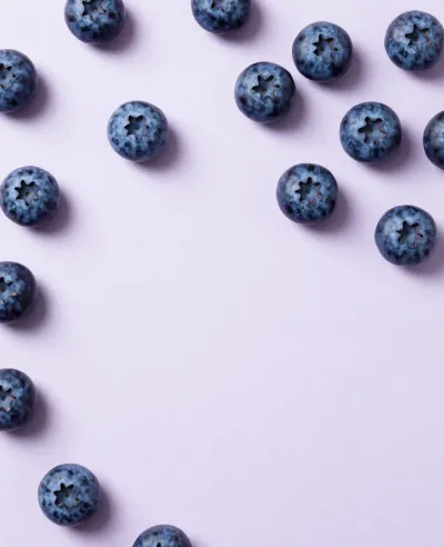 Blueberries Arranged in a Circle with Star-Shaped Indentations - Food - AI generated image